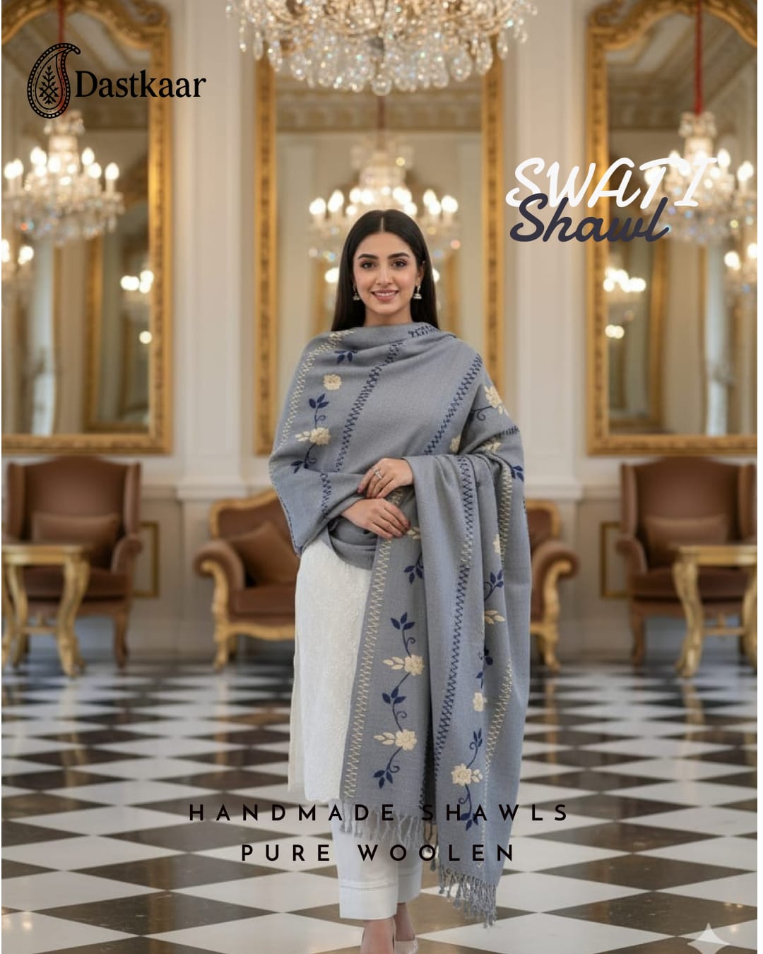 Woman wearing a gray shawl with floral patterns in an elegant room with chandeliers.